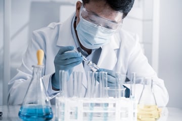 card-3271_Asian male scientist working in a laboratory