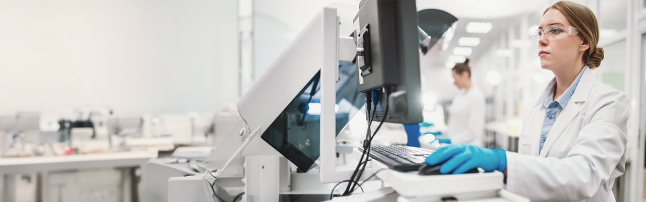 hero-bg-3210_Laboratory technicians conduct a series of tests on a chemical analyzer