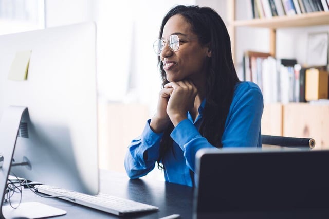 Website Featured_JPG-2076_Woman watching webinar on computer
