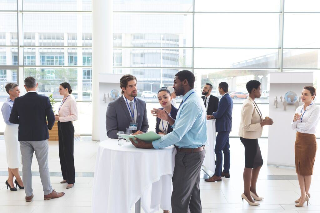 Website Featured_JPG-2187_Business people talking during conference
