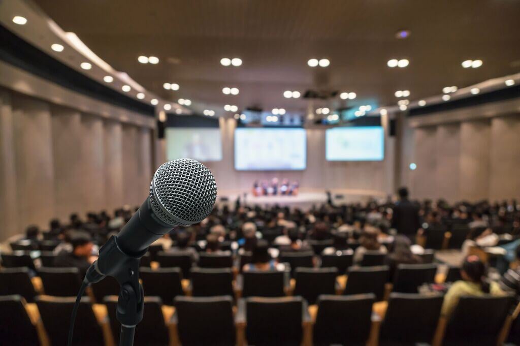 Website Featured_JPG-231_Microphone in a conference hall