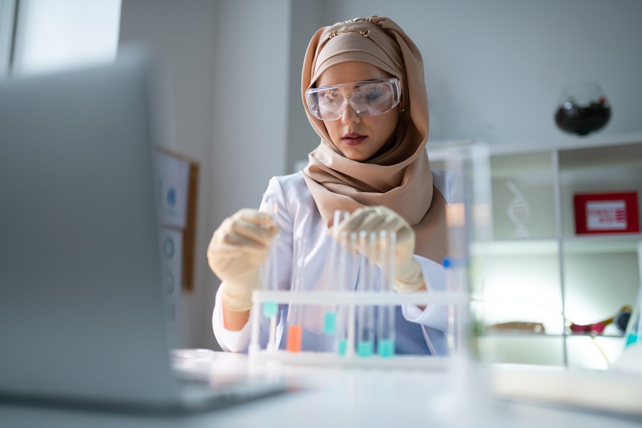 3249_Young chemist wearing hijab working in laboratory