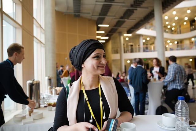 Website Featured_JPG-4529_Smiling woman during conference break