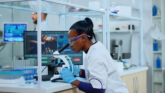Website Featured_JPG-3832_Scientist checking sample using microscope